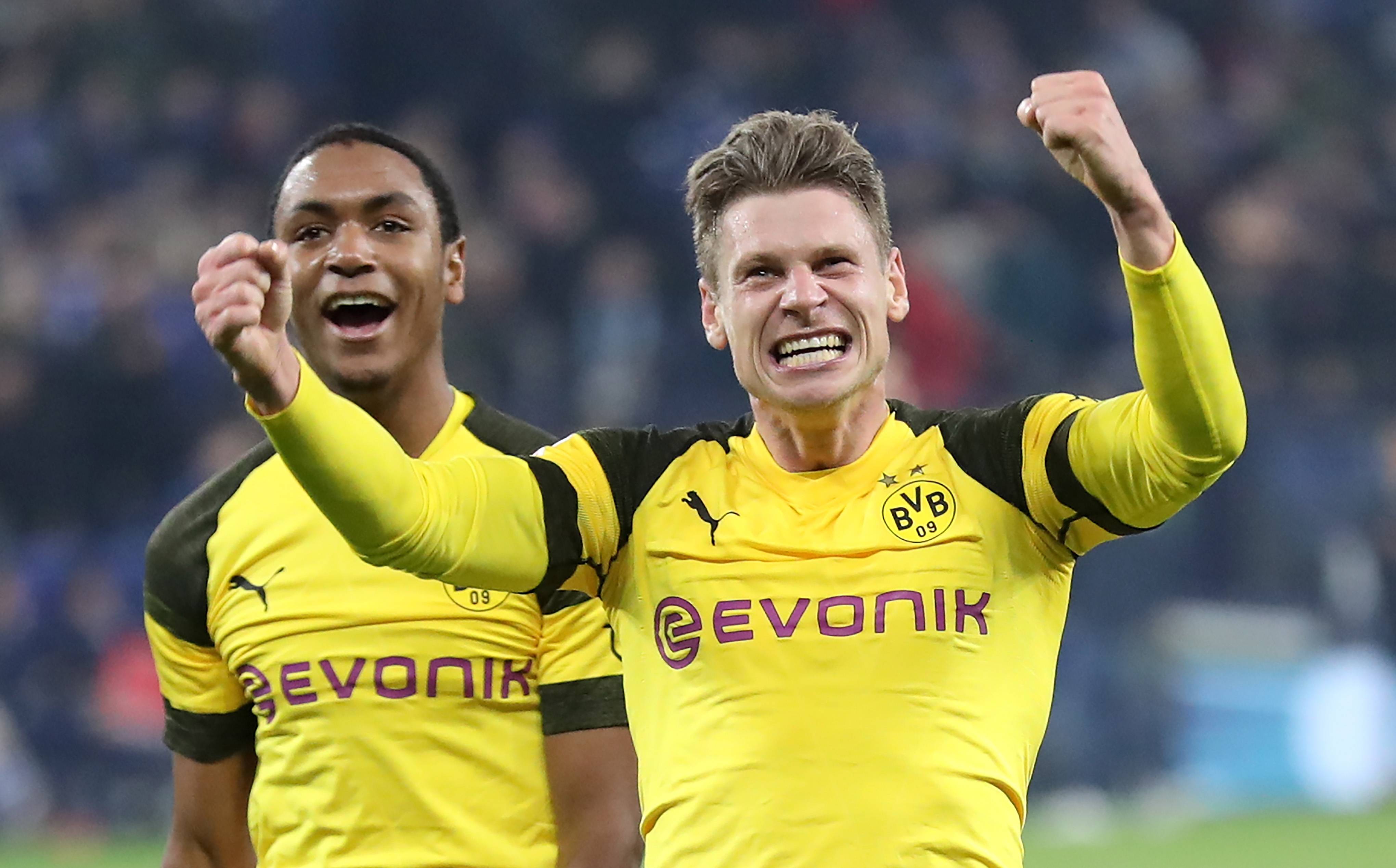 拜仁慕尼黑客场逆转多特蒙德，领跑积分榜